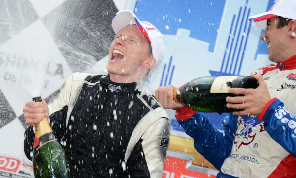 Mike Conway celebrates with Justin Wilson